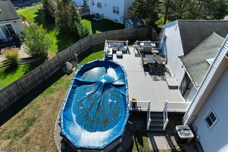 4 Marshall Road Hillsborough, NJ 08844 - Photo 33 of 38 an aerial view of a house with swimming pool and outdoor seating