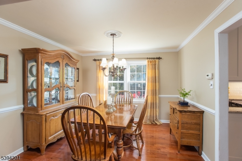4 Marshall Road Hillsborough, NJ 08844 - Photo 5 of 38 a view of a dining room with furniture window and wooden floor