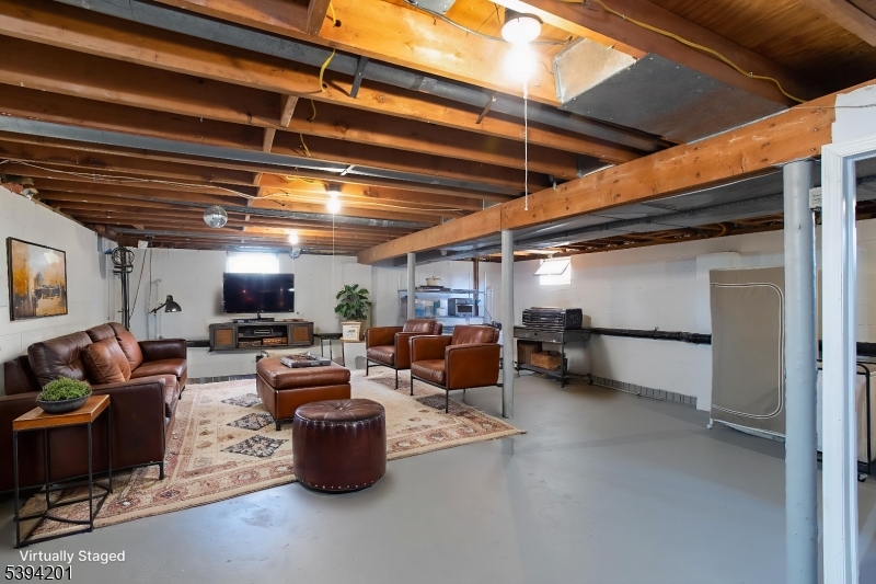 4 Marshall Road Hillsborough, NJ 08844 - Photo 8 of 38 a view of work room with couch