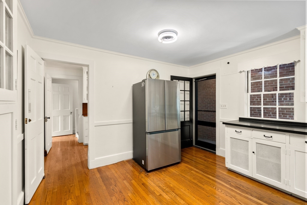 2 Kenilworth Road Wellesley, MA 02482 - Photo 20 of 41 a kitchen with granite countertop a refrigerator and a stove top oven