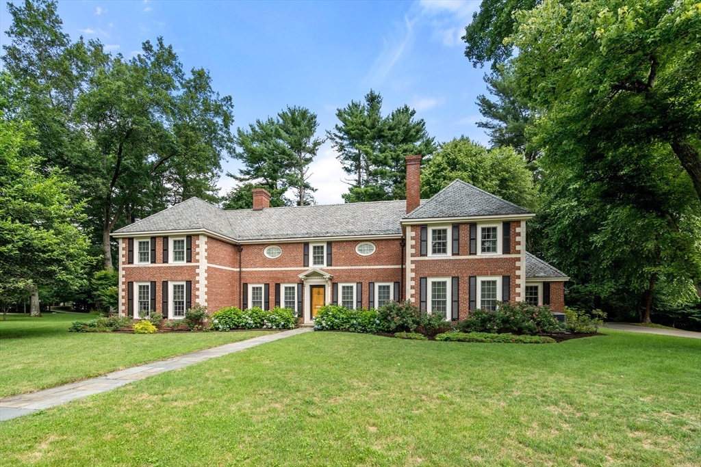 2 Kenilworth Road Wellesley, MA 02482 - Photo 2 of 41 a front view of a house with a garden