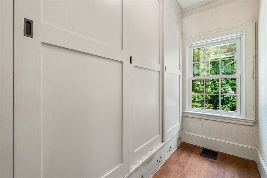 2 Kenilworth Road Wellesley, MA 02482 - Photo 25 of 41 a view of room with window and wooden floor
