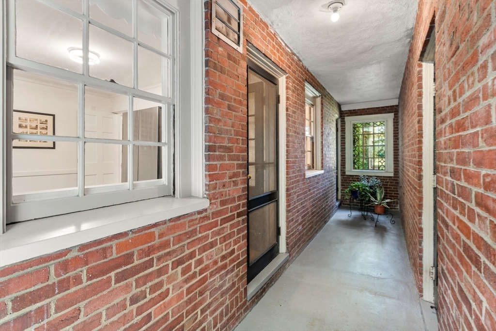 2 Kenilworth Road Wellesley, MA 02482 - Photo 33 of 41 a view of a brick house with windows