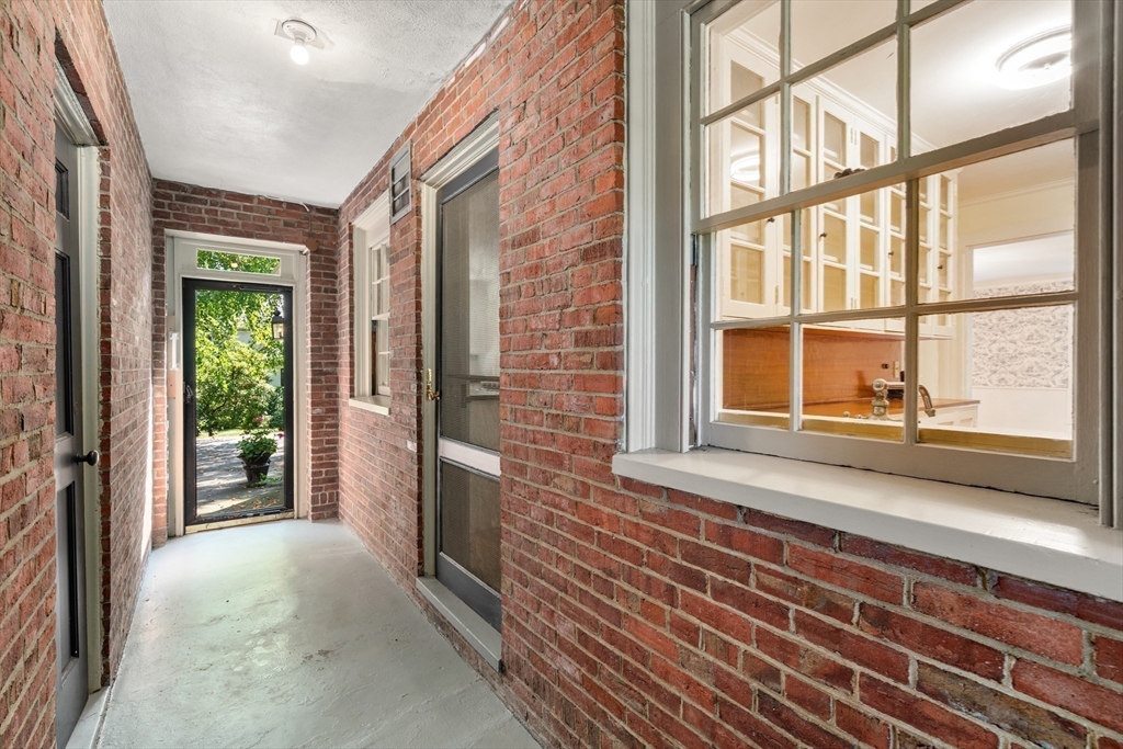 2 Kenilworth Road Wellesley, MA 02482 - Photo 34 of 41 a view of a brick house with a large window