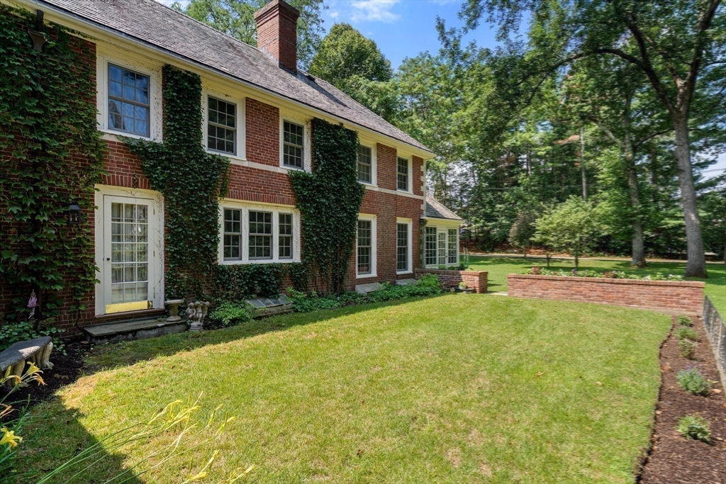 2 Kenilworth Road Wellesley, MA 02482 - Photo 37 of 41 a front view of house with yard and green space