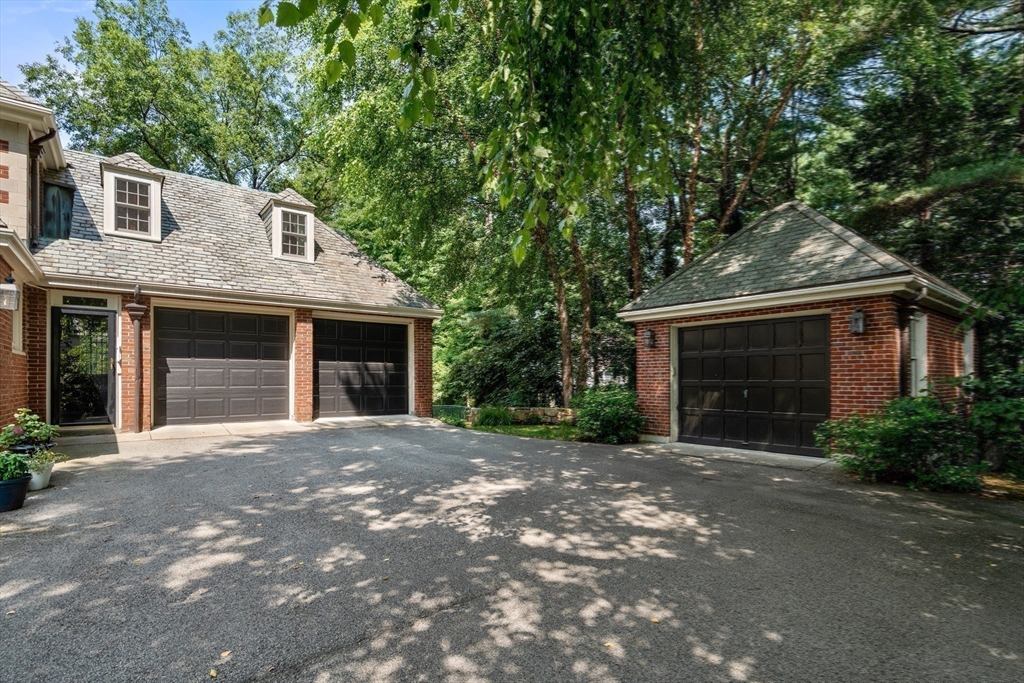 2 Kenilworth Road Wellesley, MA 02482 - Photo 40 of 41 a front view of a house with a garden