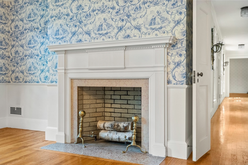 2 Kenilworth Road Wellesley, MA 02482 - Photo 8 of 41 a living room with a fireplace
