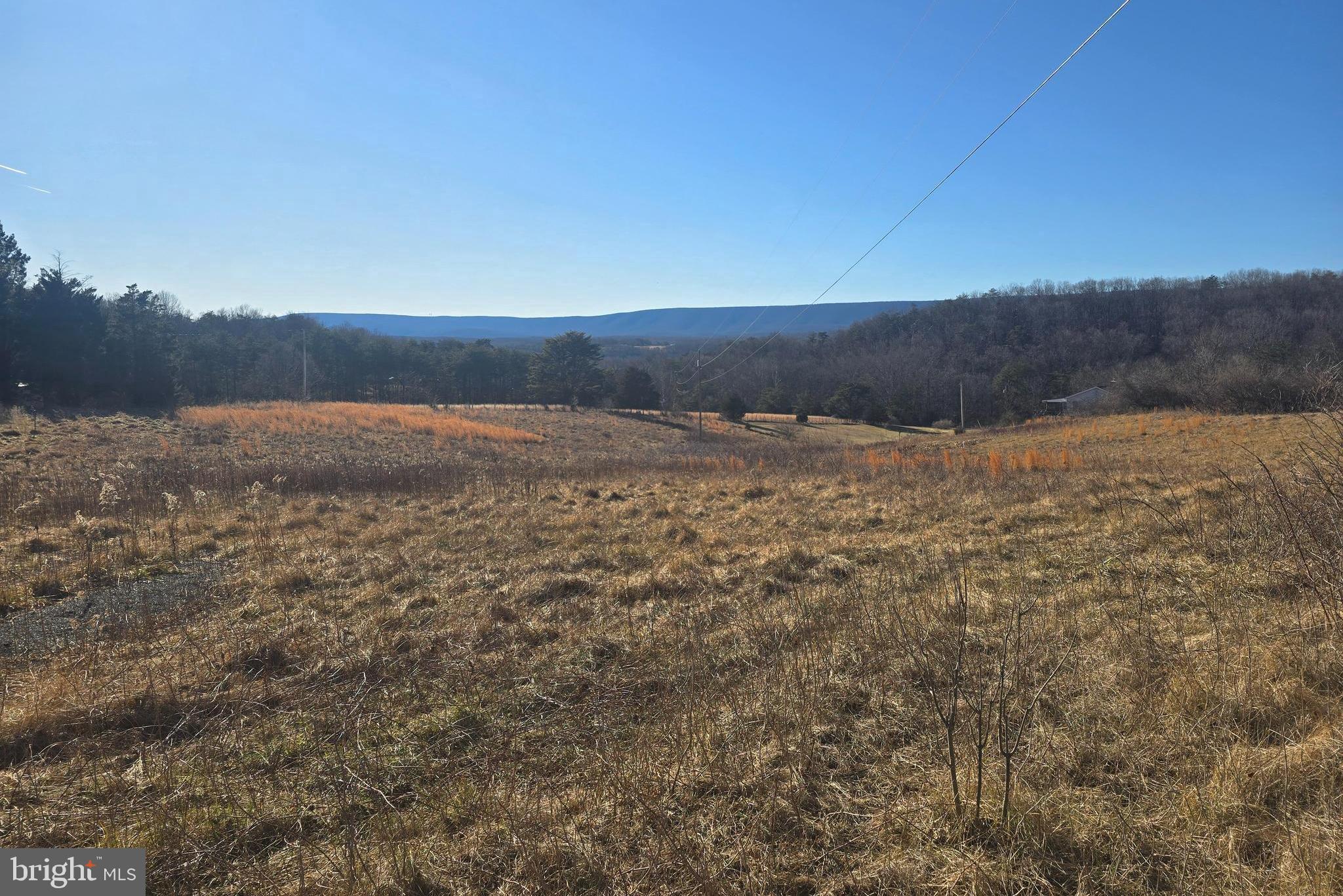 Spielman Road Berkeley Springs, WV 25411 - Photo 1 of 17 a view of an ocean beach and mountain