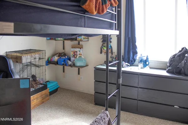 a room with water heater and a table