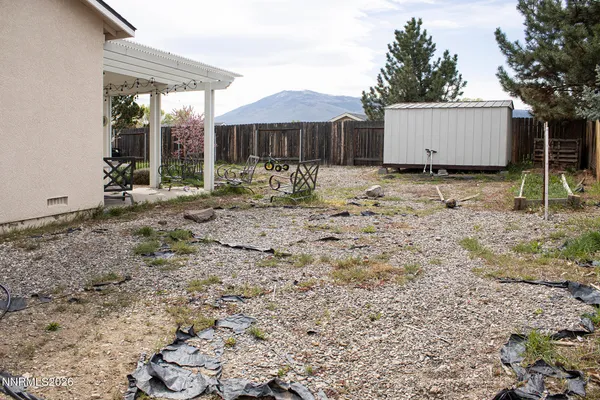 a view of a garden with houses