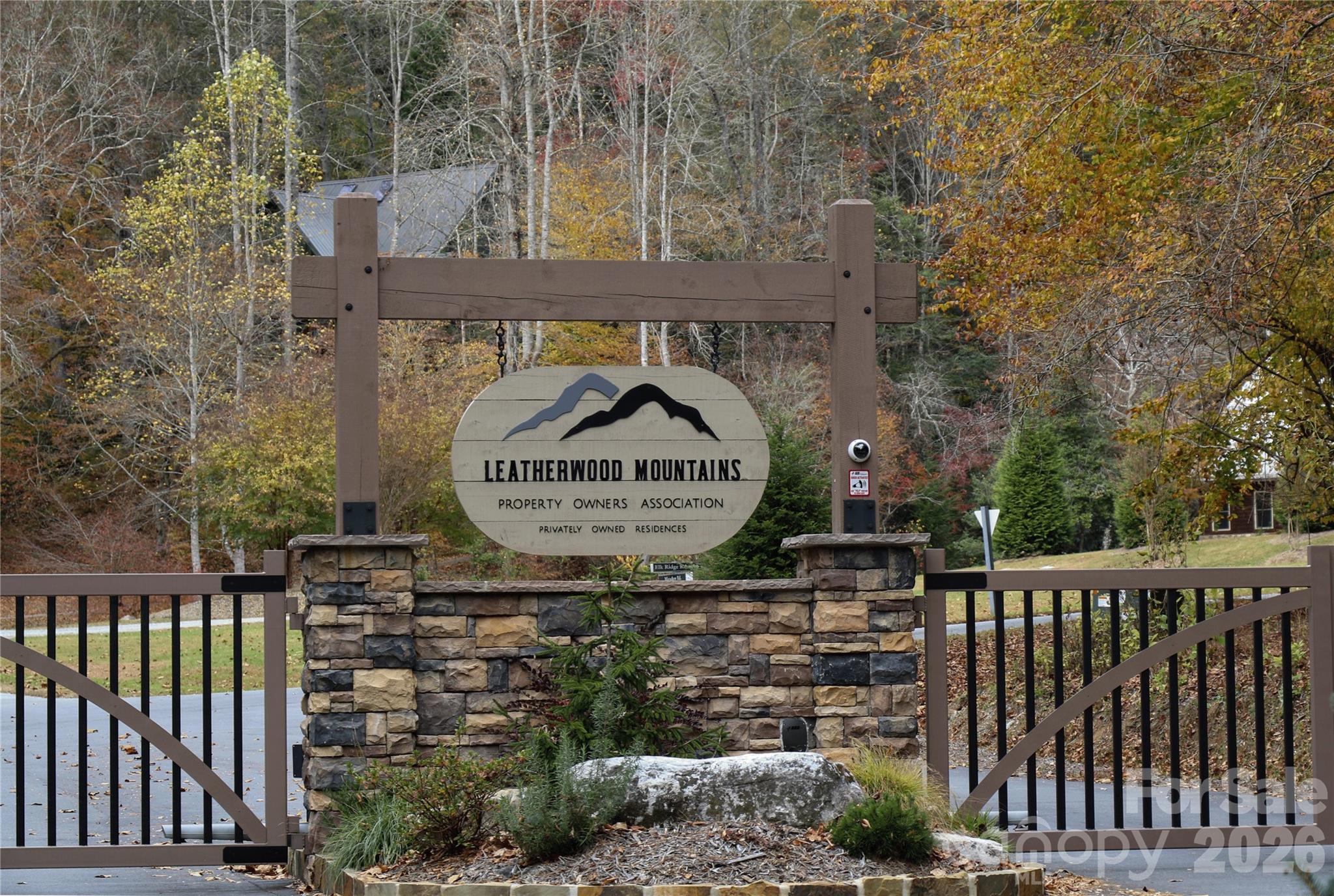 0 Big Sky Road Ferguson, NC 28624 - Photo 2 of 10 a view of a wooden door with a small yard