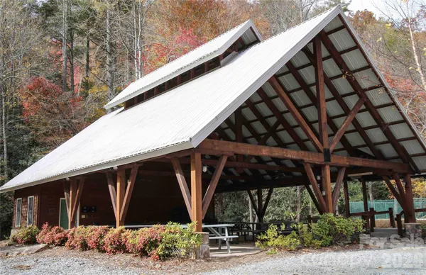 a bathroom with a bathtub and a mirror