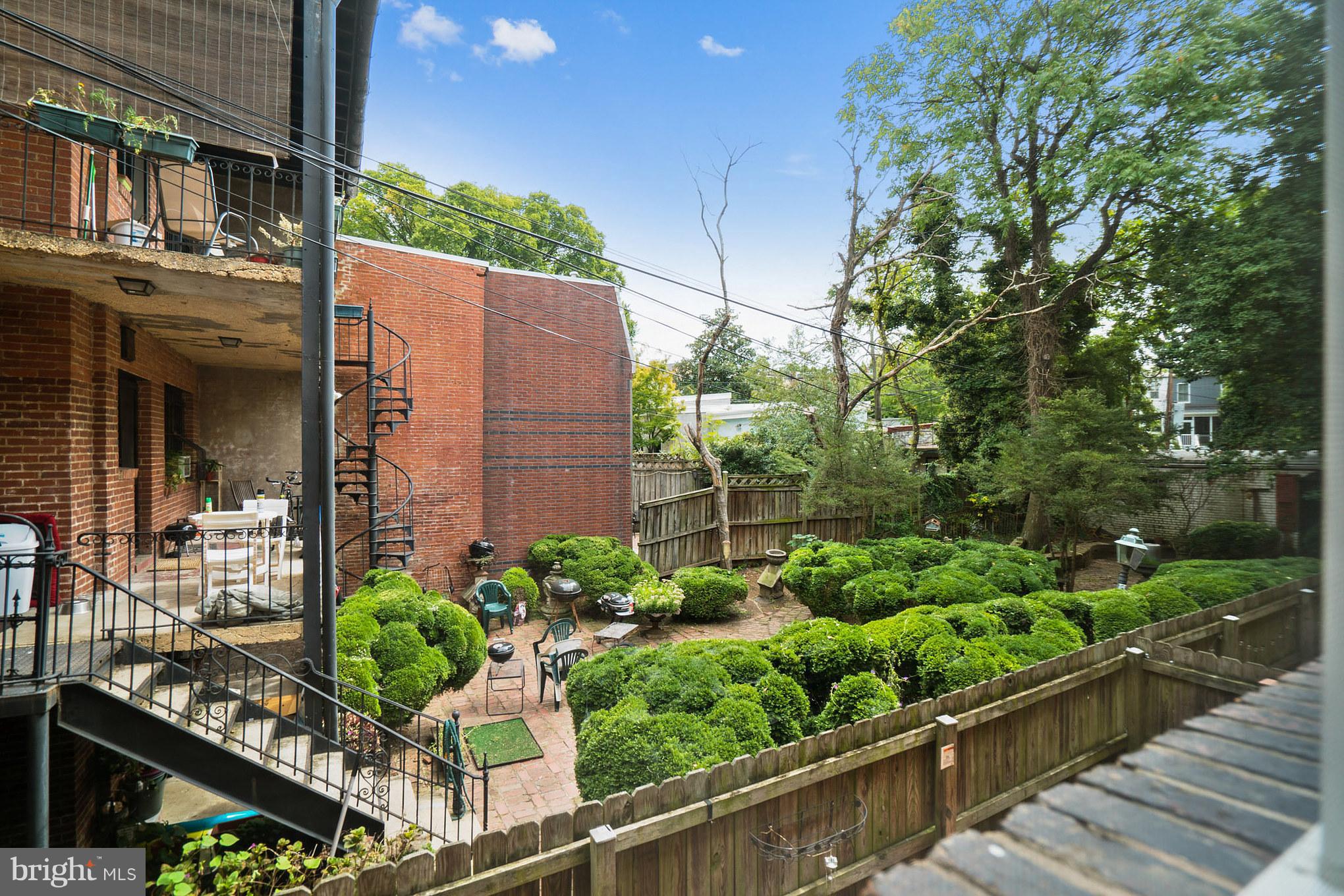 115 D Street Southeast, Unit 103 Washington, DC 20003 - Photo 9 of 14 a view of a garden with plants