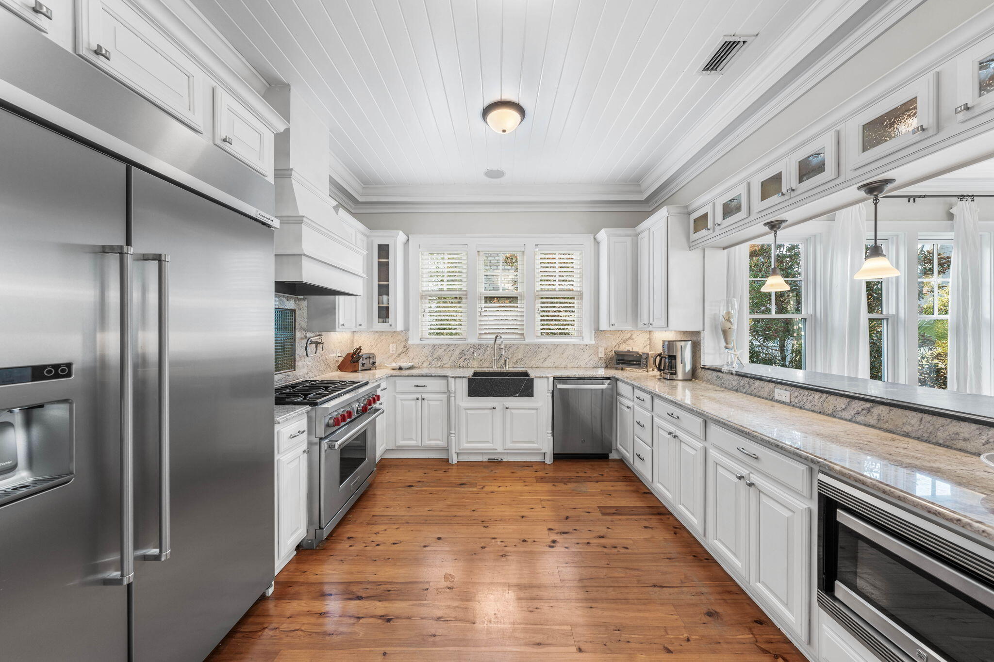 90 South Founders Lane Inlet Beach, FL 32461 - Photo 13 of 44 a large kitchen with stainless steel appliances granite countertop a large counter top stainless steel appliances and cabinets