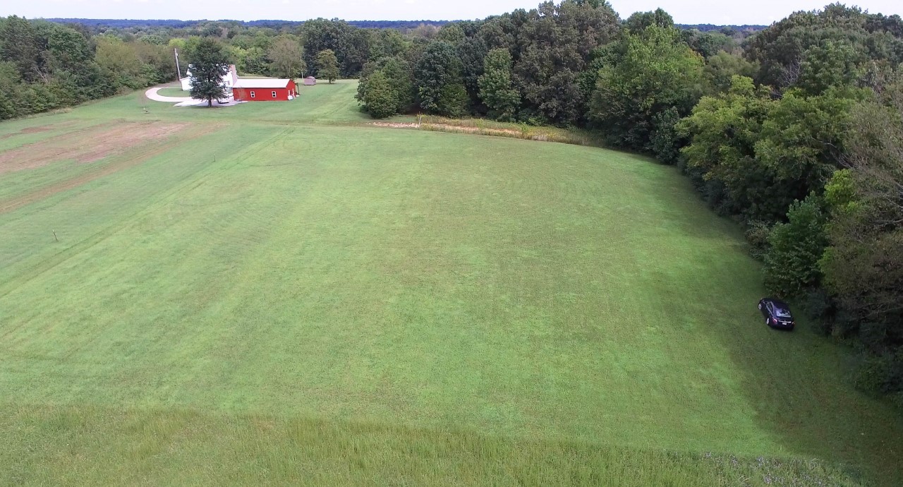 822 Clearview Road Cottontown, TN 37048 - Photo 3 of 6 a backyard of a house with lots of green space