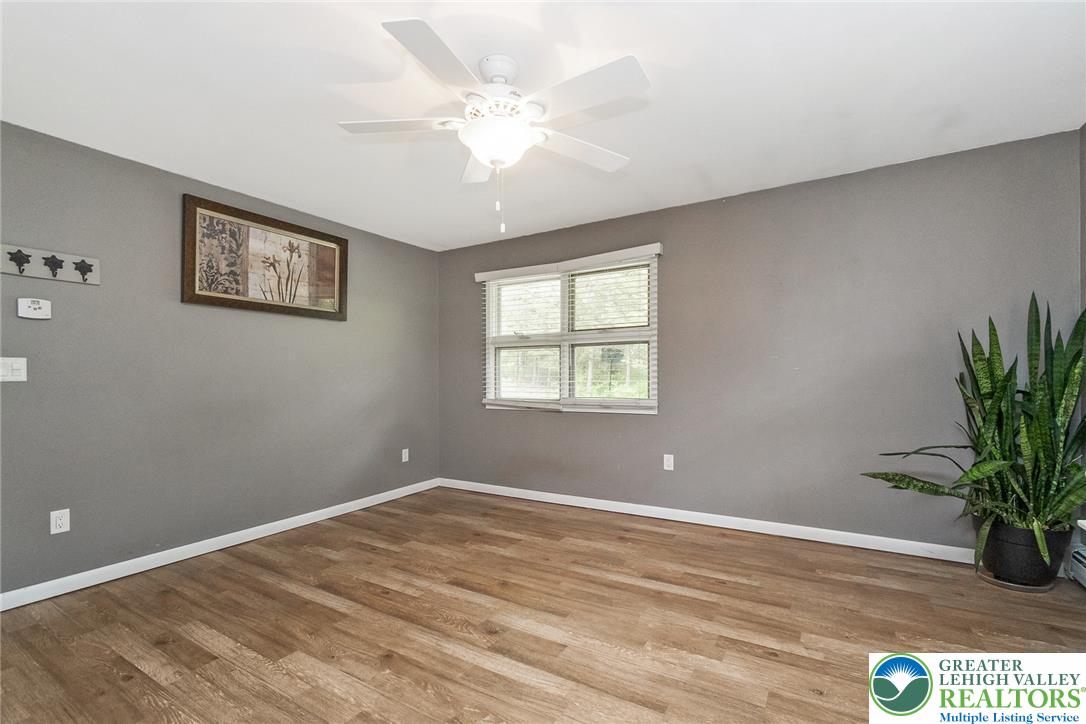 135 Haney Road Kunkletown, PA 18058 - Photo 21 of 53 a view of a room with wooden floor and potted plant