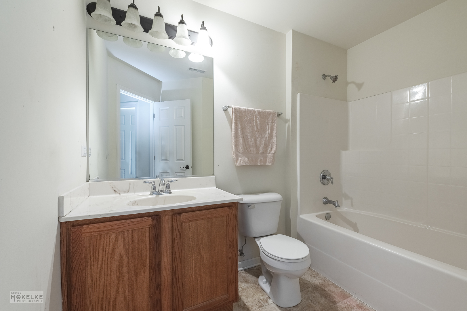 286 Wolverine Drive Oswego, IL 60543 - Photo 17 of 23 a bathroom with a sink a toilet and shower
