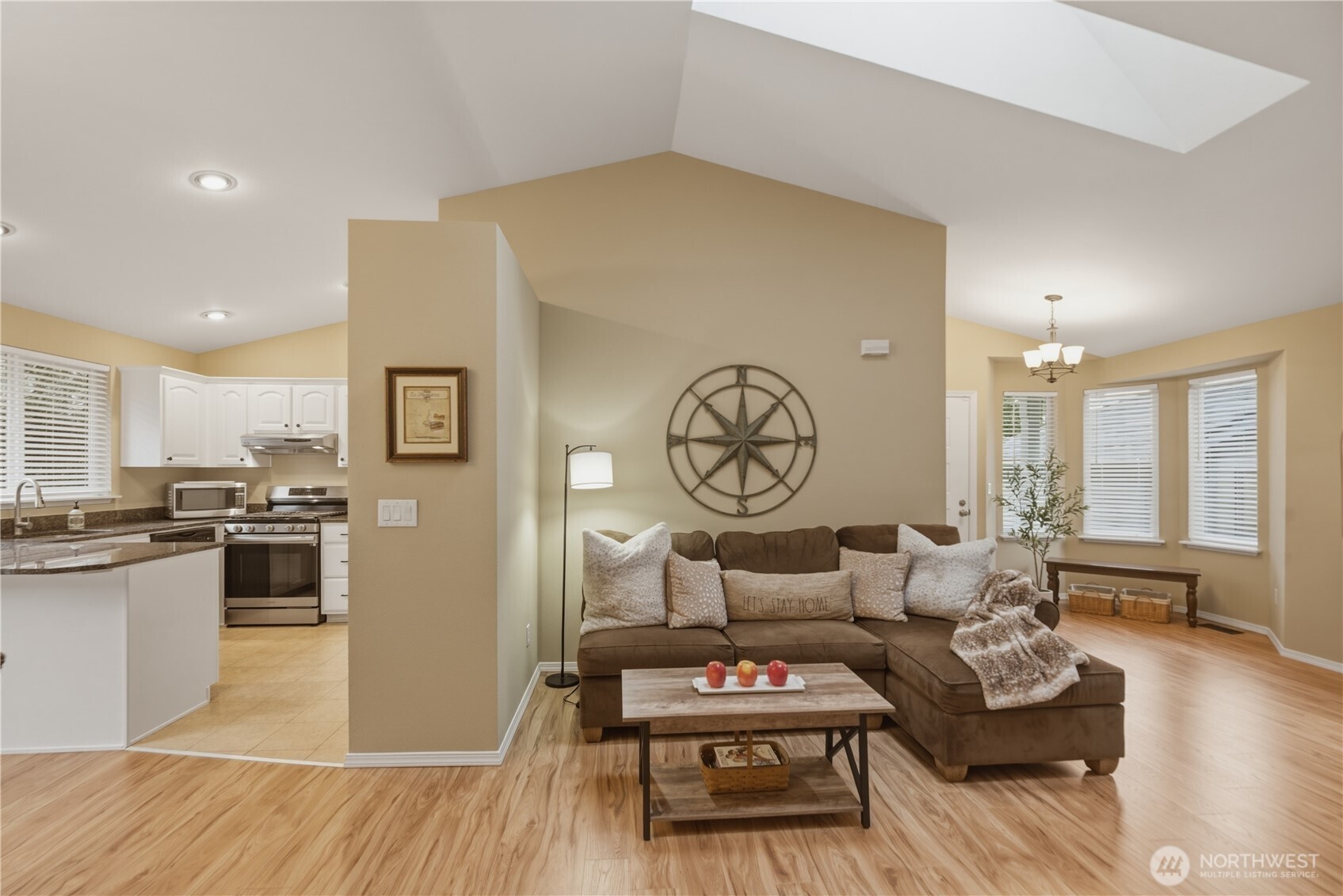 2415 Southeast 8th Place Renton, WA 98057 - Photo 2 of 39 a living room with furniture and wooden floor
