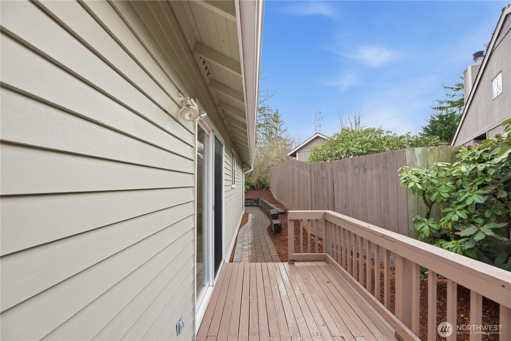 2415 Southeast 8th Place Renton, WA 98057 - Photo 29 of 39 a view of balcony with wooden floor and fence