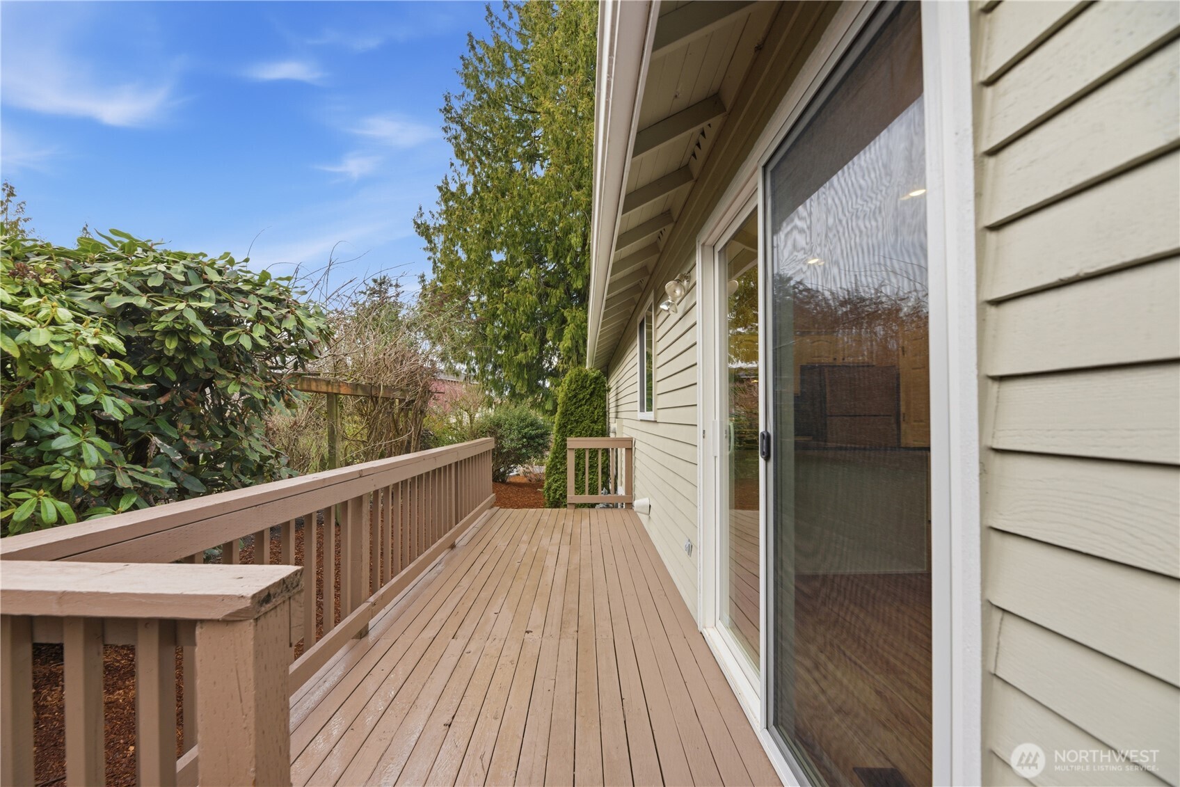2415 Southeast 8th Place Renton, WA 98057 - Photo 30 of 39 a view of a balcony with wooden floor and fence