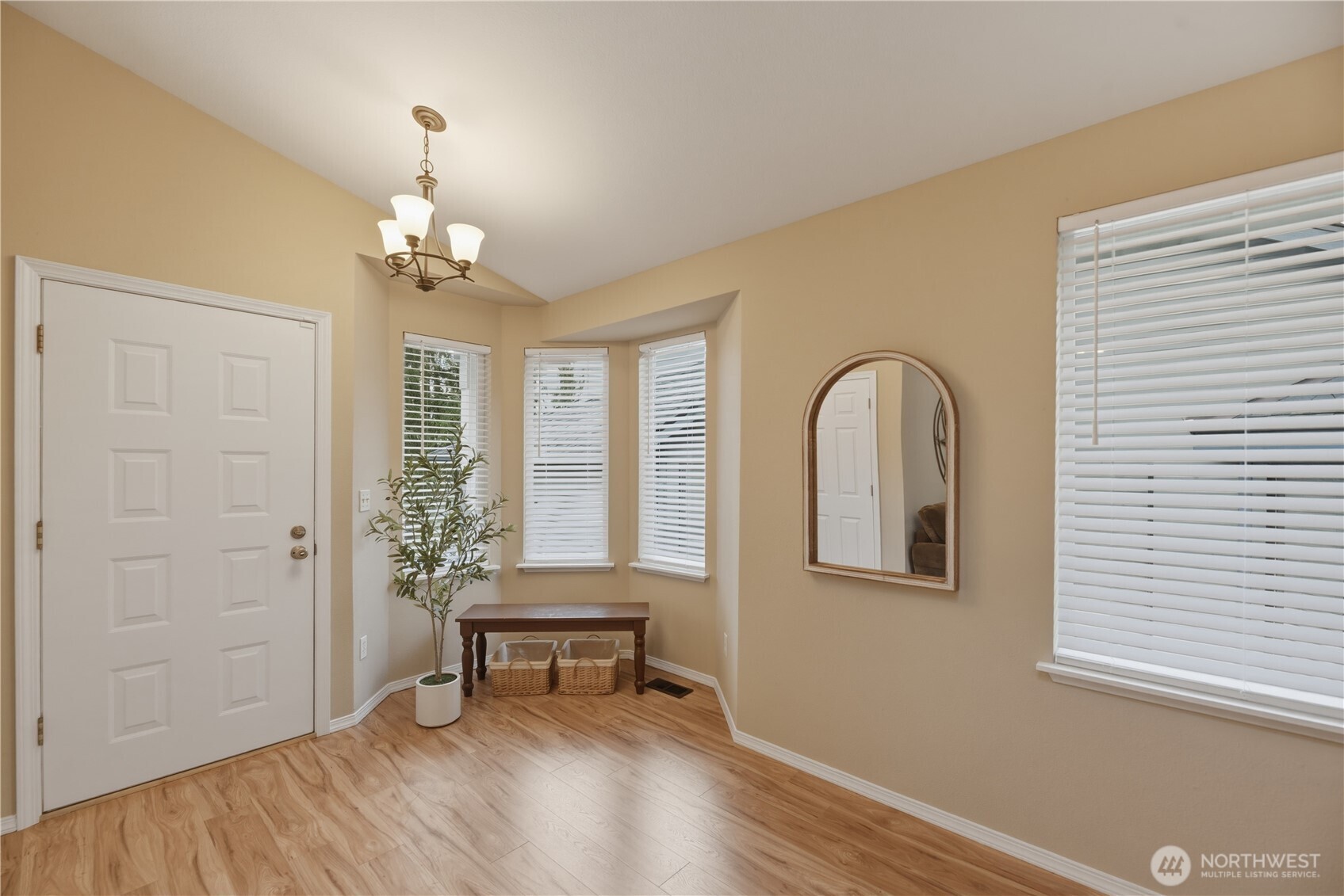 2415 Southeast 8th Place Renton, WA 98057 - Photo 33 of 39 a view of a livingroom with furniture window and wooden floor