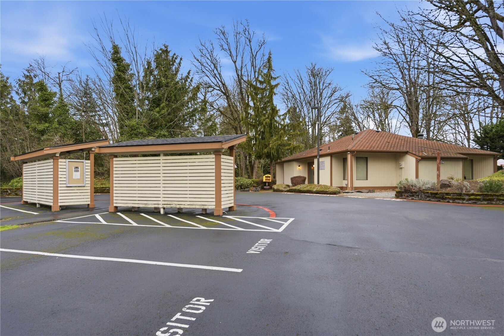 2415 Southeast 8th Place Renton, WA 98057 - Photo 38 of 39 a front view of a house with a yard and garage