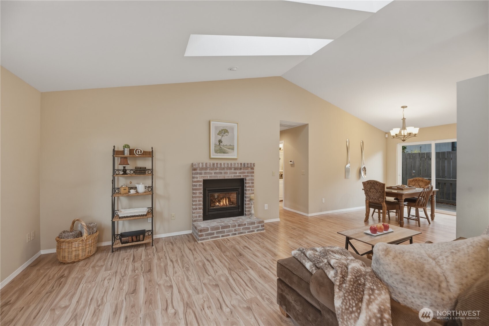 2415 Southeast 8th Place Renton, WA 98057 - Photo 4 of 39 a living room with furniture and a fireplace