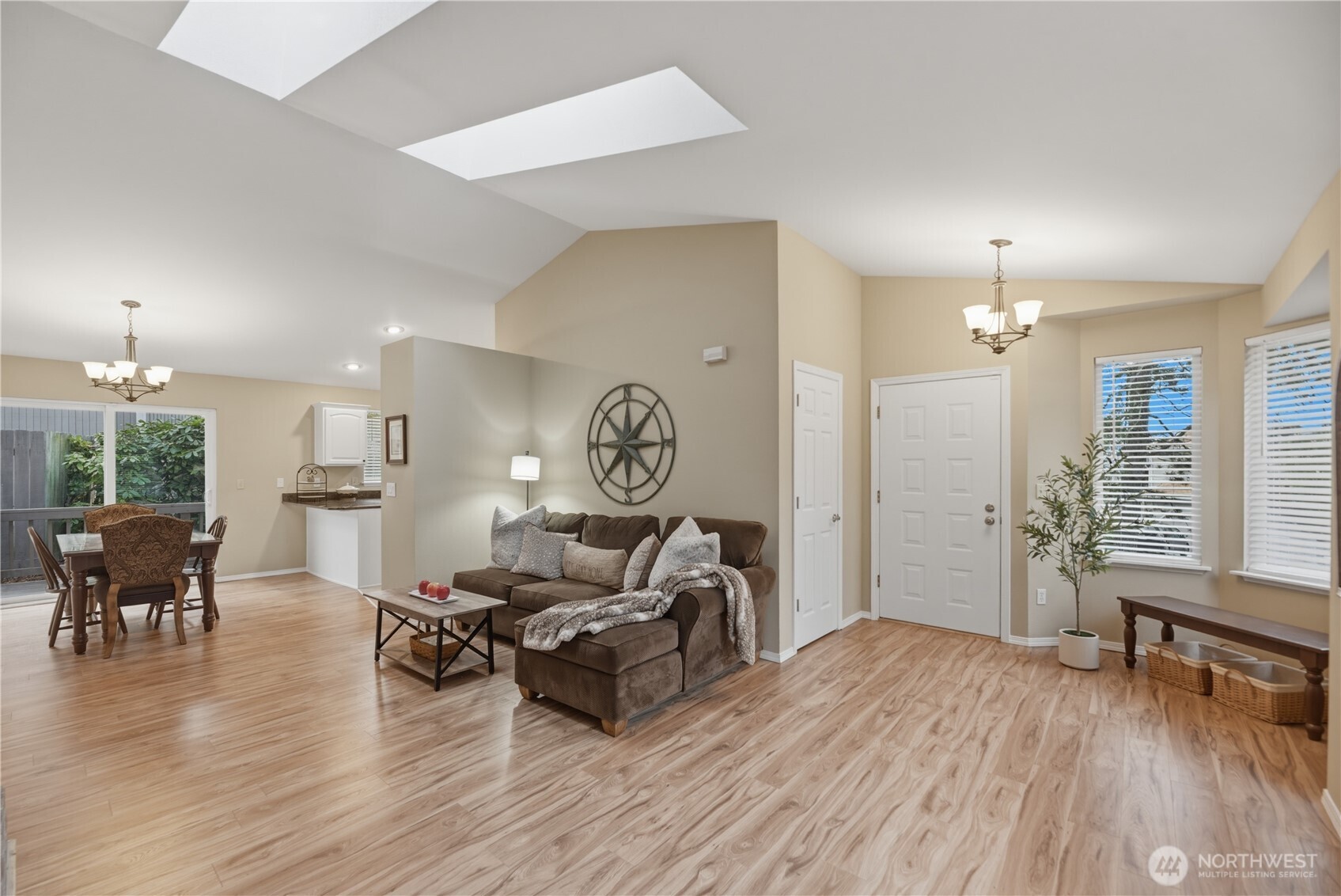 2415 Southeast 8th Place Renton, WA 98057 - Photo 6 of 39 a living room with furniture and a wooden floor