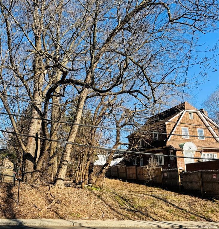 824 Saw Mill River Road Yonkers, NY 10710 - Photo 6 of 6 View of yard featuring fence
