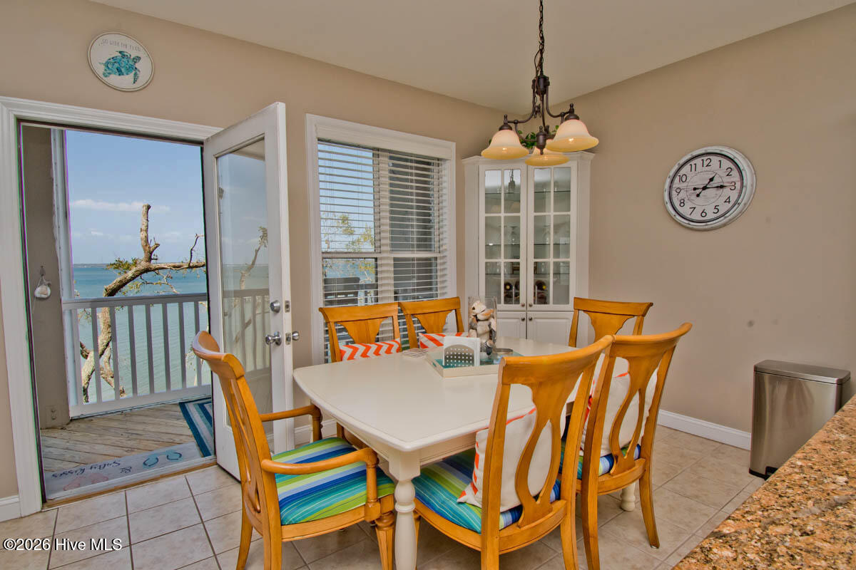1700 Salter Path Road, Unit 202R Indian Beach, NC 28512 - Photo 8 of 41 Inside dining with a view.