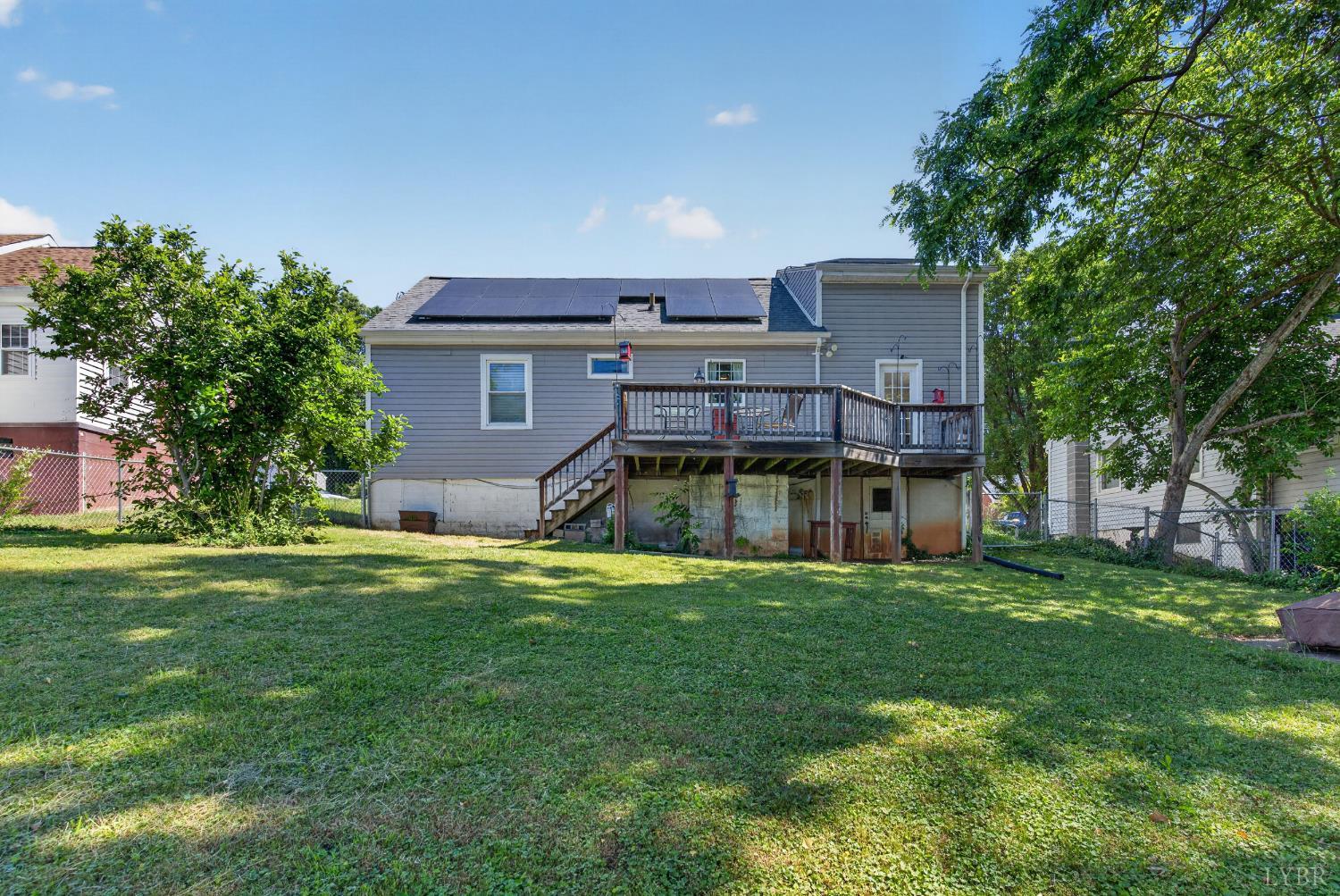 1305 Harding Street Lynchburg, VA 24502 - Photo 28 of 33 a view of a house with a big yard plants and large trees
