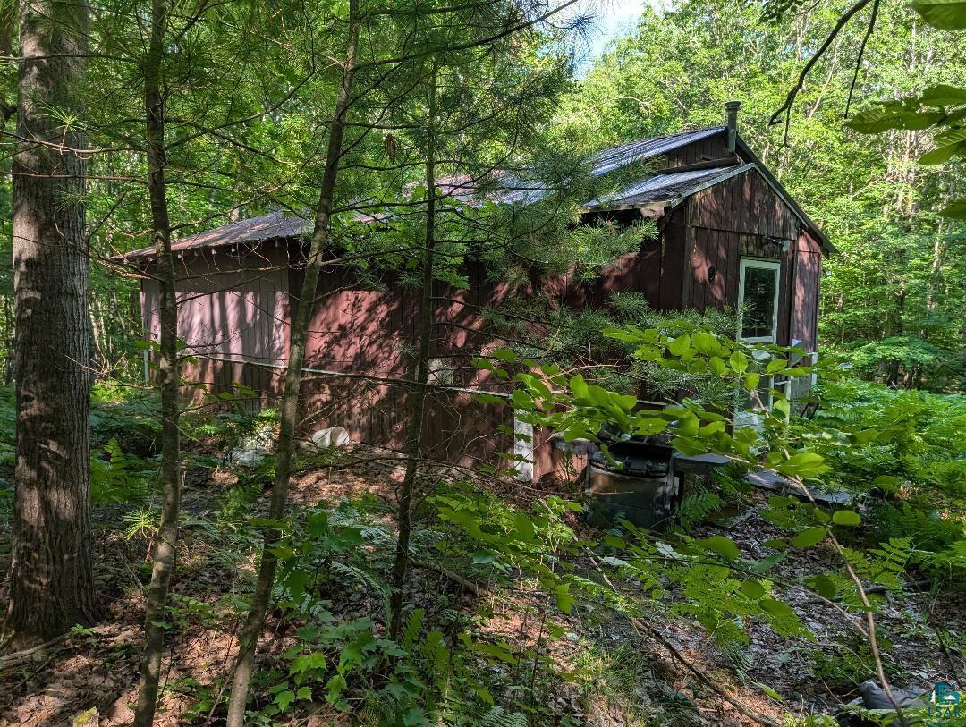 0 Randysek Road Cable, WI 54821 - Photo 1 of 26 View of outbuilding with a view of trees