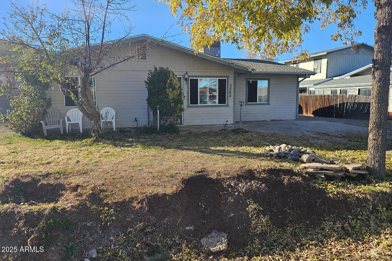 3500 North Tower Road Prescott Valley, AZ 86314 - Photo 1 of 14 a view of a house with a yard