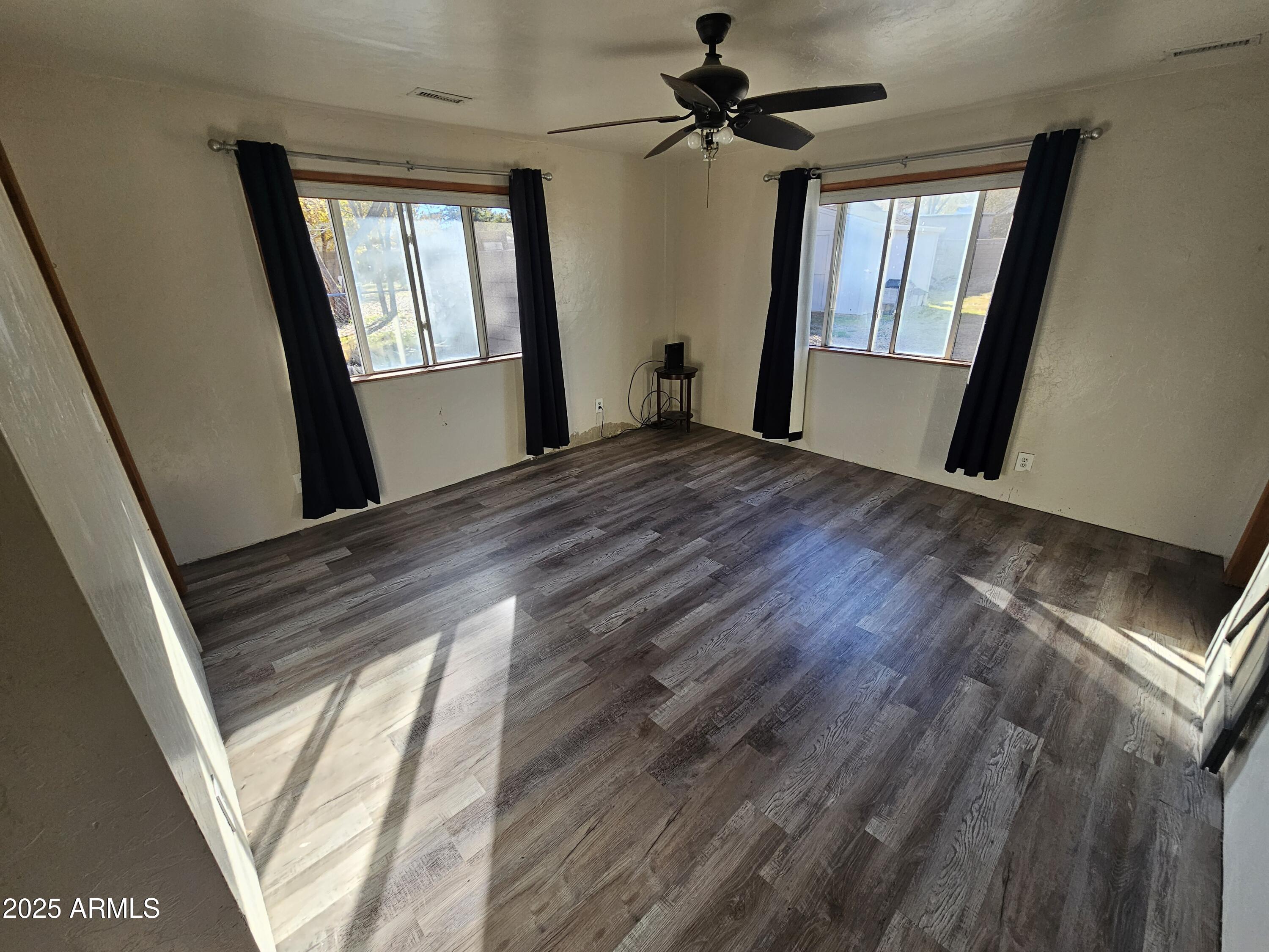 3500 North Tower Road Prescott Valley, AZ 86314 - Photo 5 of 14 a view of an empty room and window