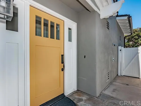 a view of a kitchen with granite countertop cabinets