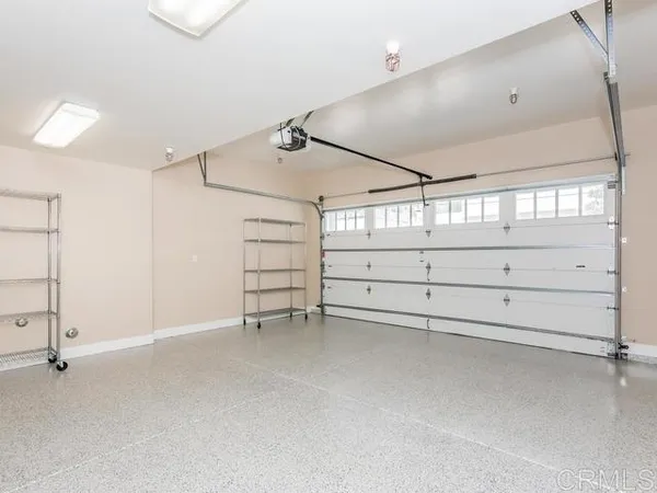 a view of empty room with windows