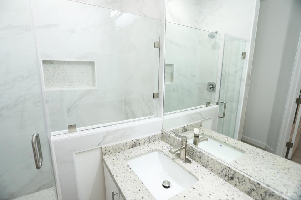 901 East Yuma Avenue, Unit 1806 McAllen, TX 78503 - Photo 11 of 12 a bathroom with a sink and a mirror