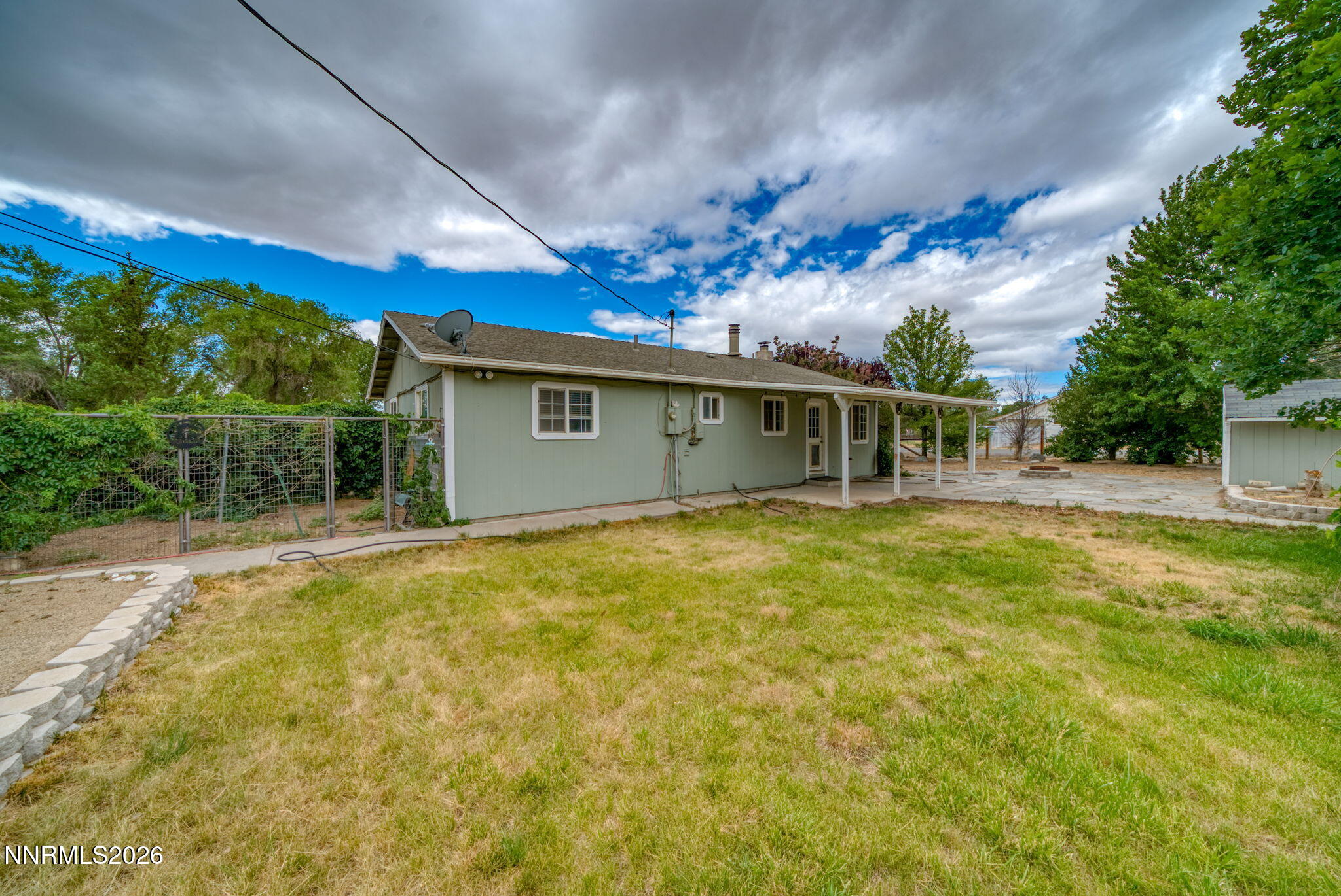 11577 Deodar Way Reno, NV 89506 - Photo 49 of 58 a view of a house with a backyard