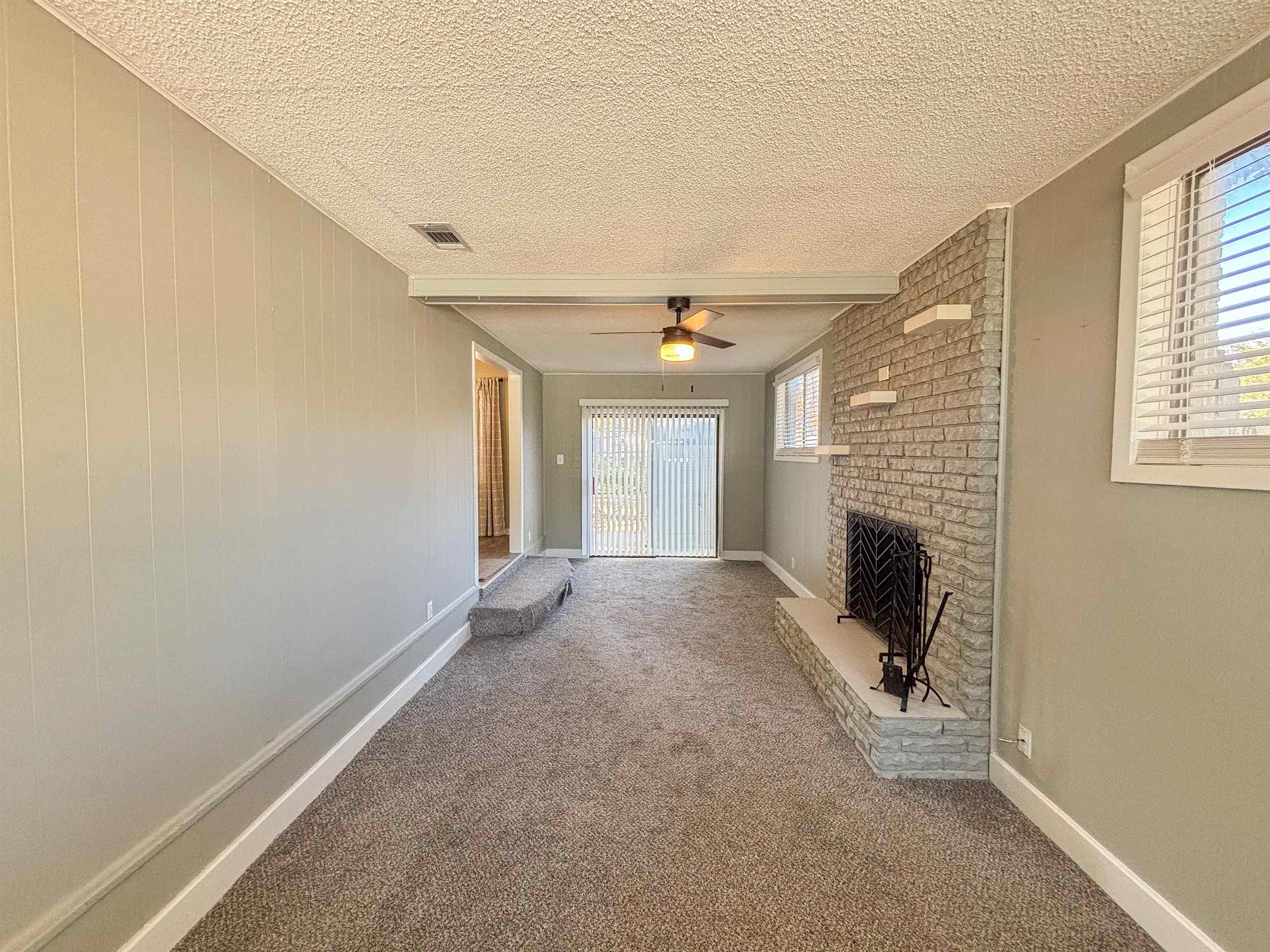 3057 Keats Road Bartlett, TN 38134 - Photo 10 of 23 Corridor with carpet flooring and a textured ceiling