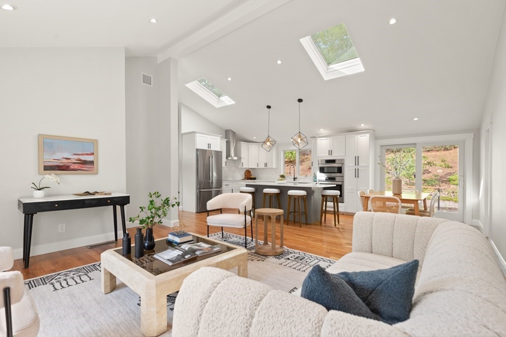 17 Saunders Road Lynnfield, MA 01940 - Photo 14 of 42 a living room with furniture and a large window