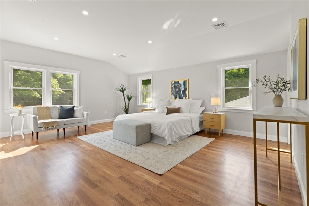 17 Saunders Road Lynnfield, MA 01940 - Photo 23 of 42 a bedroom with a large bed and a couch