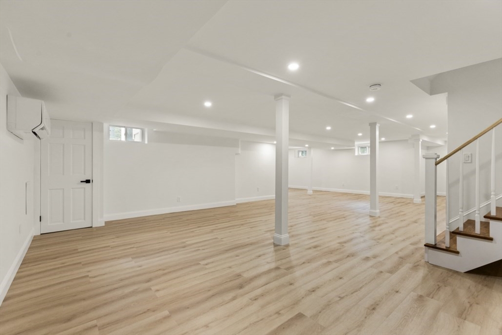 17 Saunders Road Lynnfield, MA 01940 - Photo 32 of 42 a view of a room with gym equipment and a window