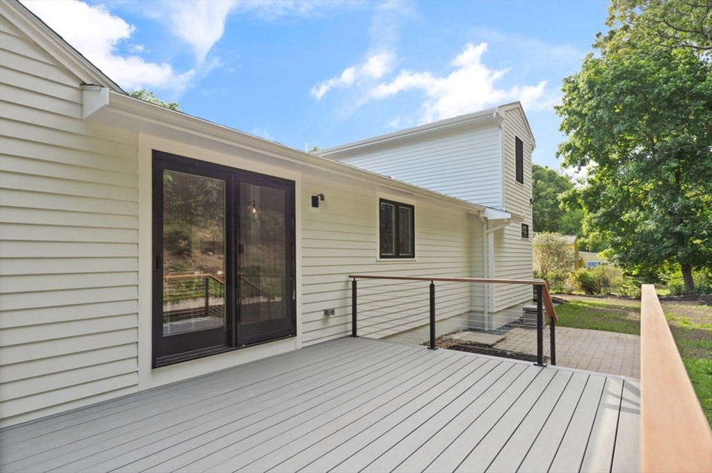 17 Saunders Road Lynnfield, MA 01940 - Photo 36 of 42 a view of a house with wooden deck