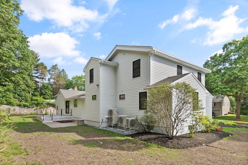 17 Saunders Road Lynnfield, MA 01940 - Photo 38 of 42 a view of a house with a yard