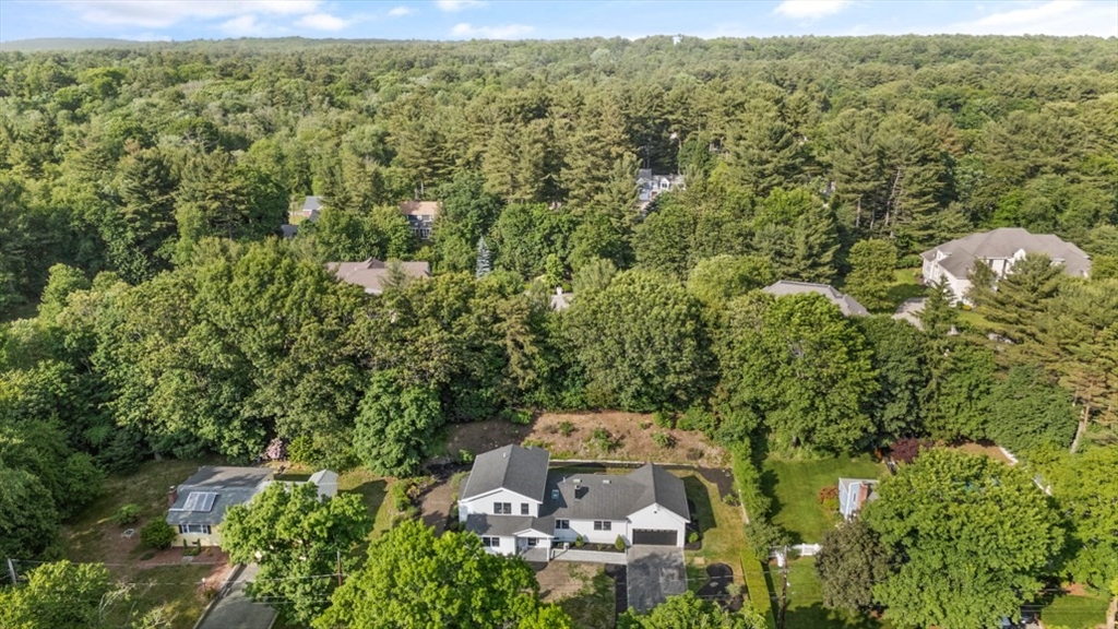 17 Saunders Road Lynnfield, MA 01940 - Photo 40 of 42 an aerial view of a house with a yard