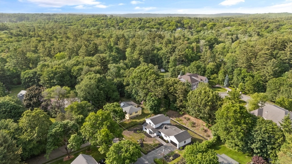 17 Saunders Road Lynnfield, MA 01940 - Photo 41 of 42 an aerial view of a house with a yard