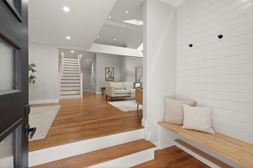 17 Saunders Road Lynnfield, MA 01940 - Photo 5 of 42 a lobby with furniture and wooden floor
