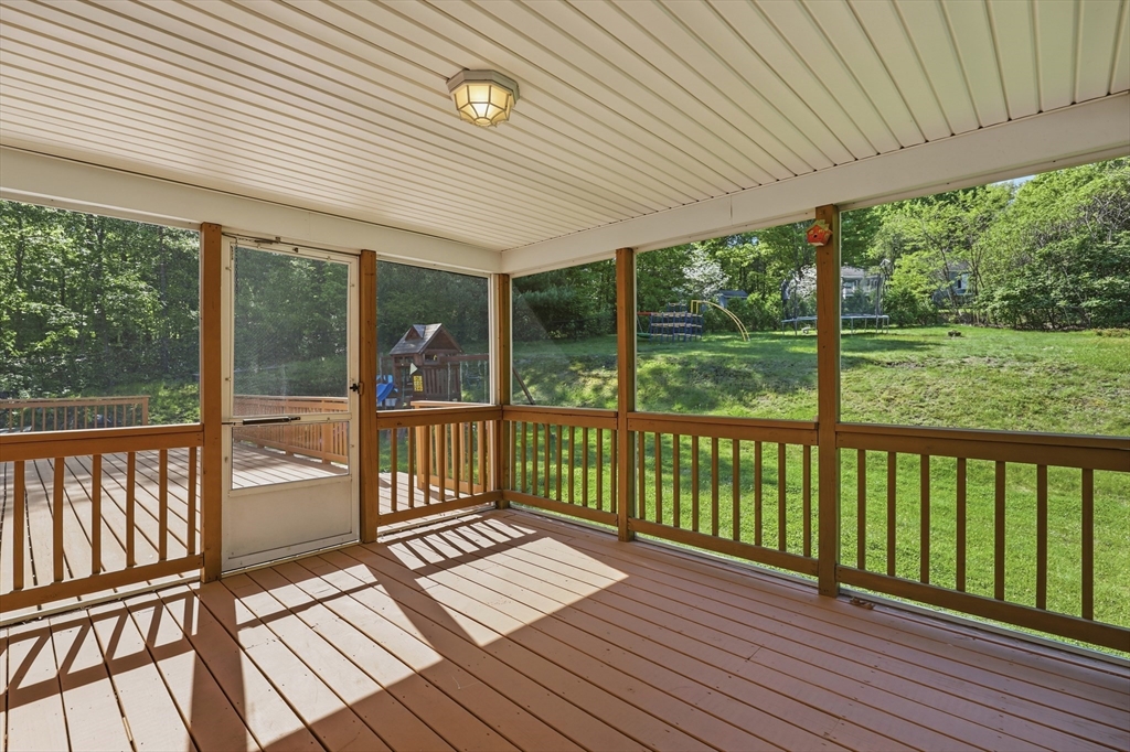 61 Indian Head Road Framingham, MA 01701 - Photo 35 of 42 a view of a balcony with wooden floor