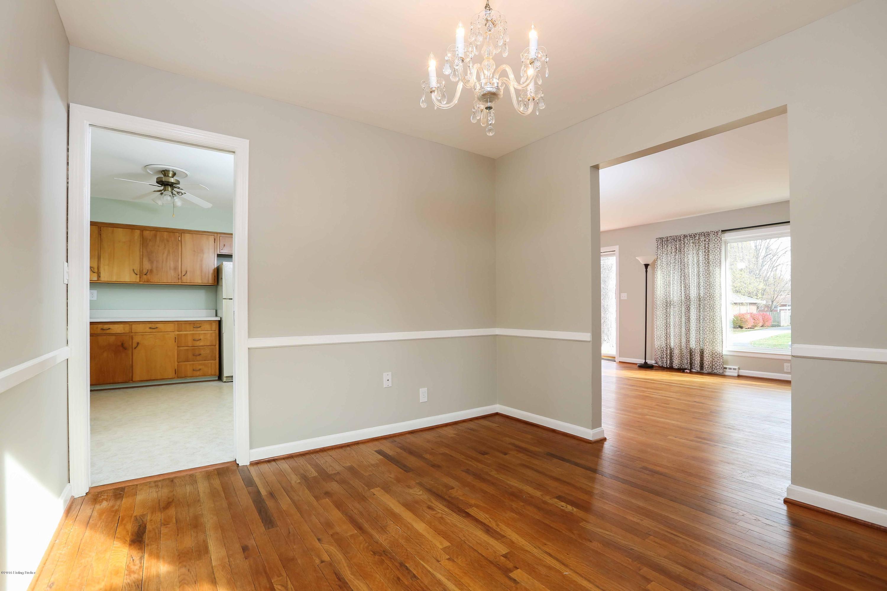 Dining w/Hardwood & Crystal Chandelier
