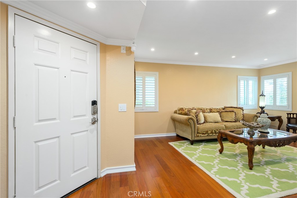 36 Corniche Drive, Unit B Dana Point, CA 92629 - Photo 2 of 37 Laminated flooring throughout the unit